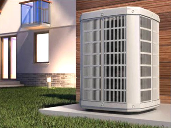 Outdoor heat pump unit installed beside a house